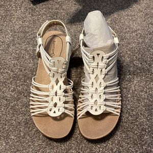 Size 9, strapy heels. Brand new.